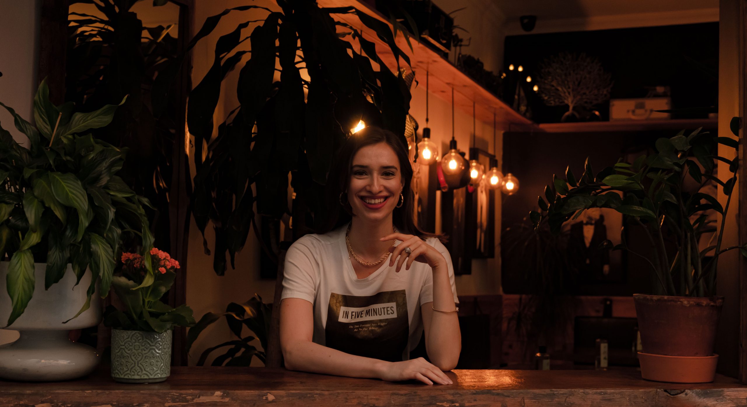 Smiling girl in restaurant
